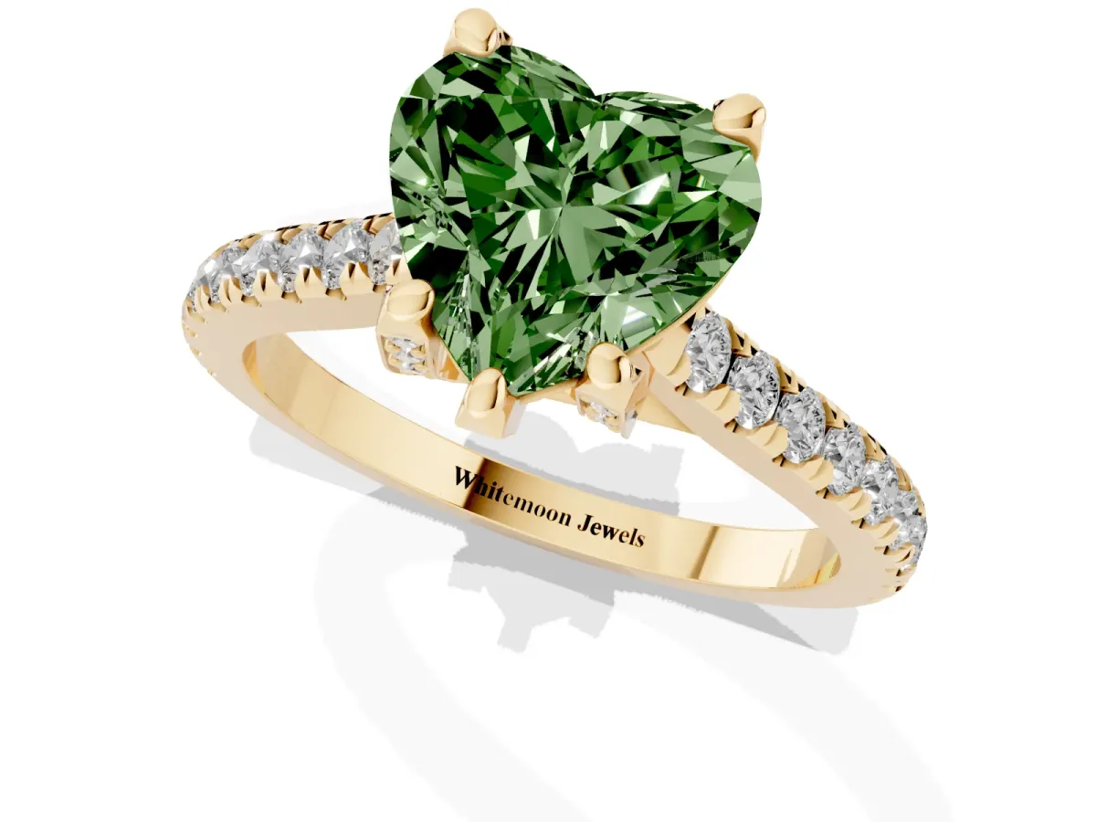 Fancy Green Heart Cut Brilliant Diamond Solitaire with Pavé Band and Four-Prong Setting Yellow gold