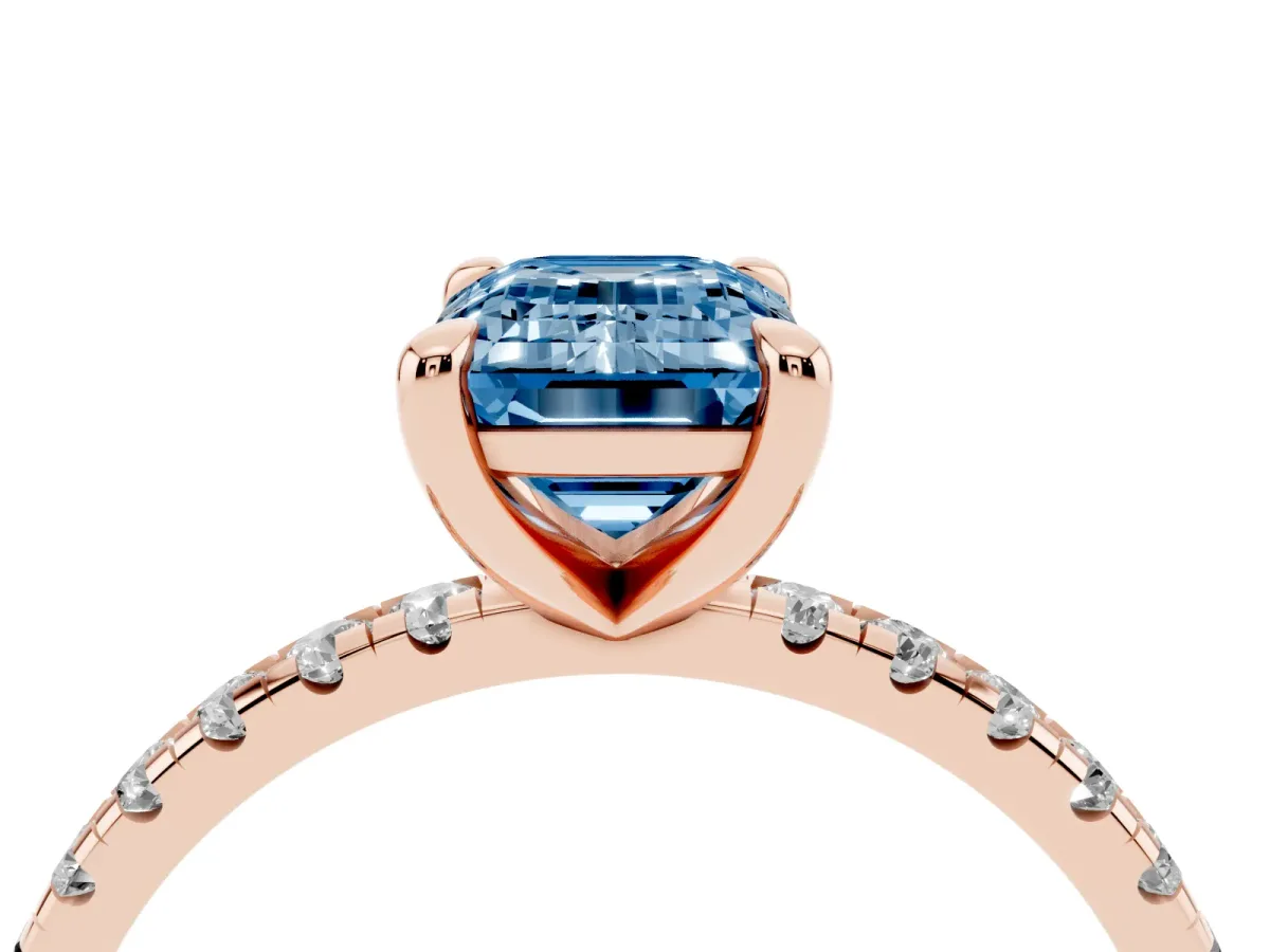 Fancy Blue Emerald Cut Diamond Brilliant Solitaire Ring with Pavé Band and Four-Prong Setting Rose gold