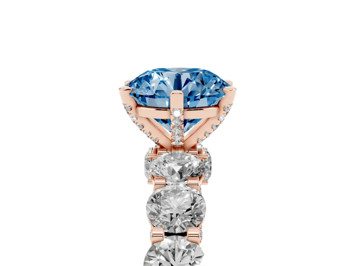 Fancy Blue Round Cut Diamond Side Stone Engagement Ring with Four-Prong Setting Rose gold