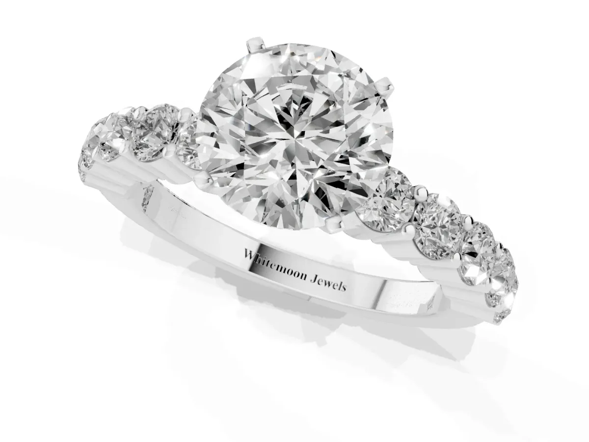 Round Cut Diamond Solitaire Ring with Shared Prong Round Side Stones Silver