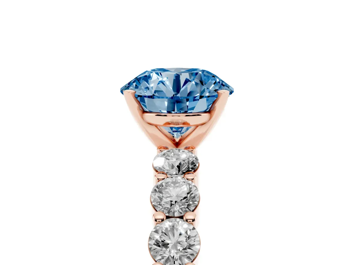 Fancy Blue Round Cut Diamond Solitaire Ring with Shared Prong Round Side Stones Rose gold