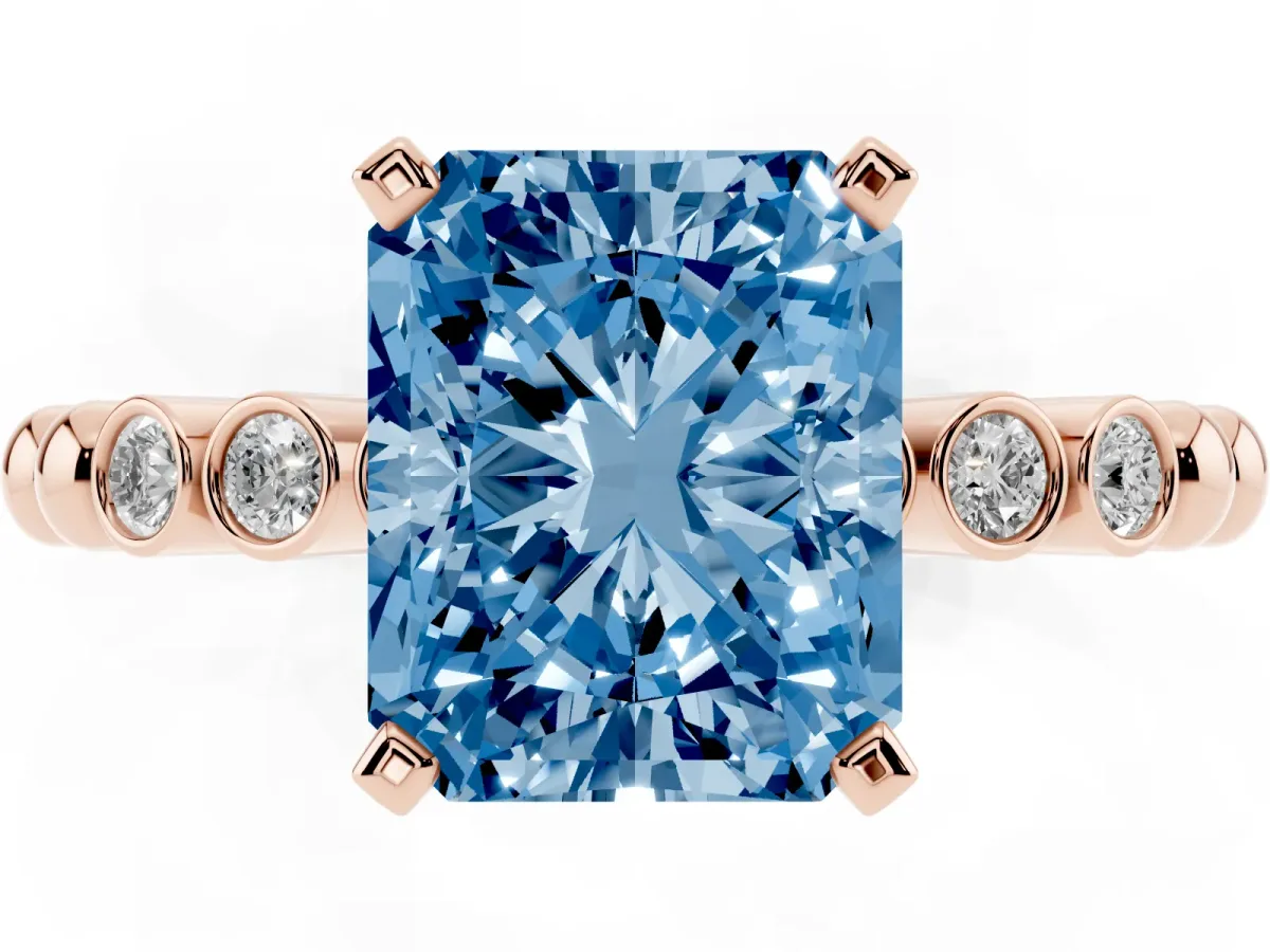 Fancy Blue Radiant Cut Solitaire Bezel Accent Diamond Engagement Ring with Beaded Band and Four-Prong Setting Rose gold