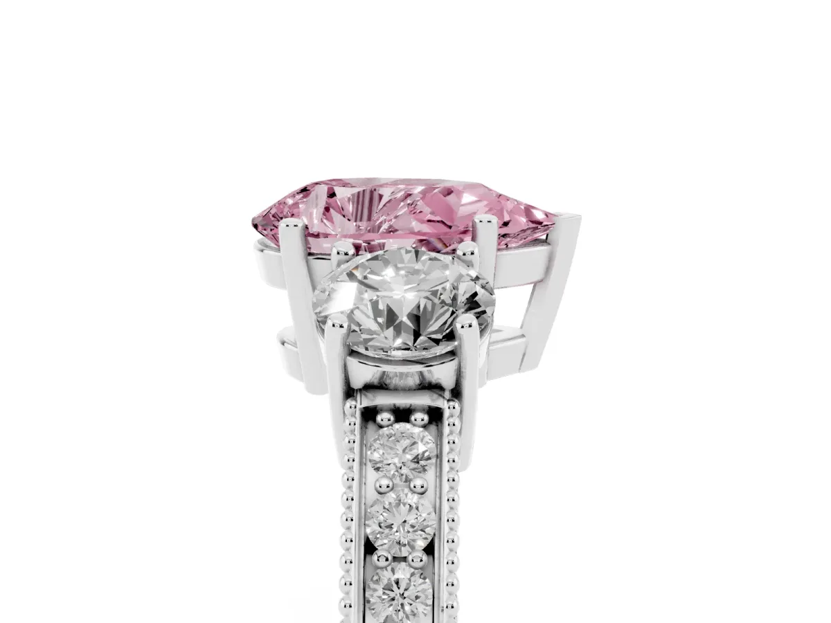 Fancy Pink Pear Cut Three-Stone Diamond Ring with Pavé Band and Four-Prong Setting Silver