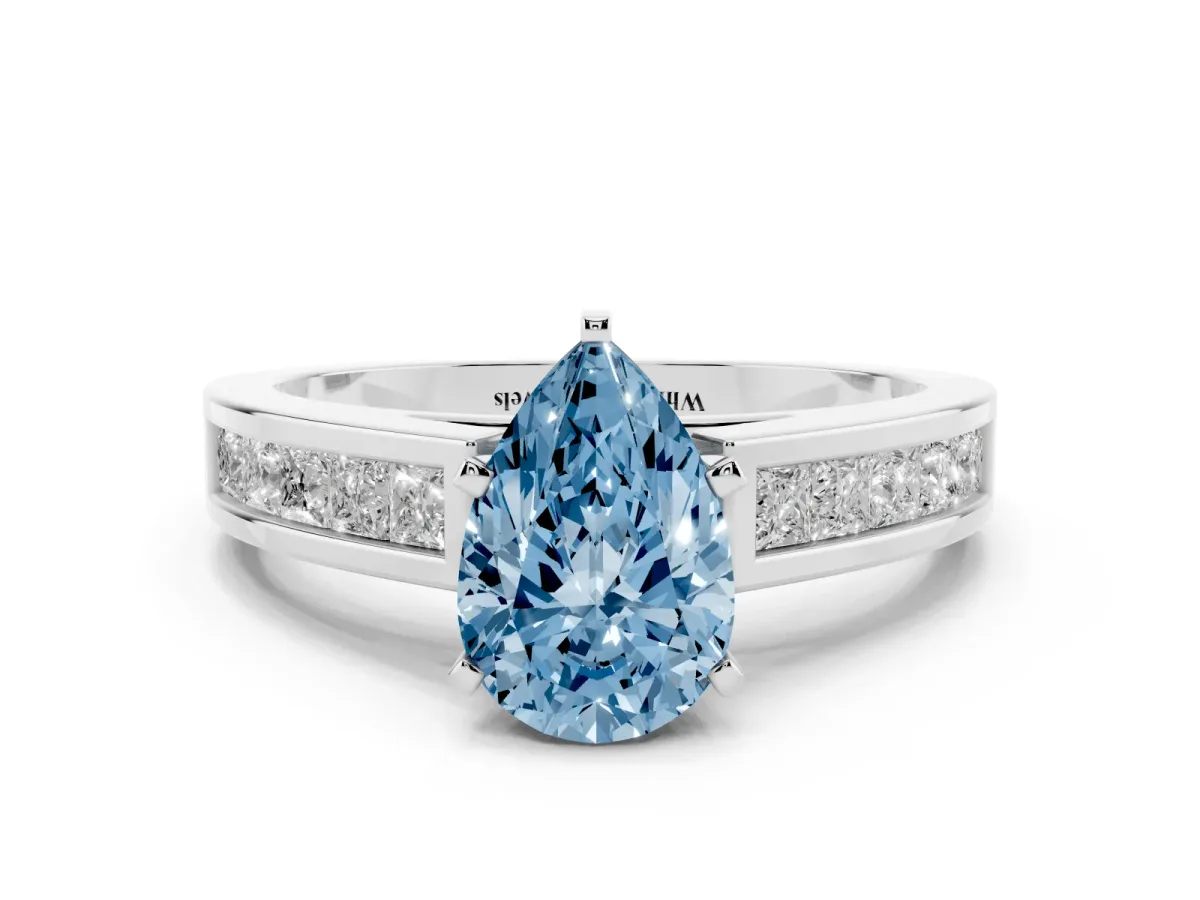Fancy Blue Pear Cut Solitaire Diamond Ring with Channel-Set Band and Four-Prong Setting Silver