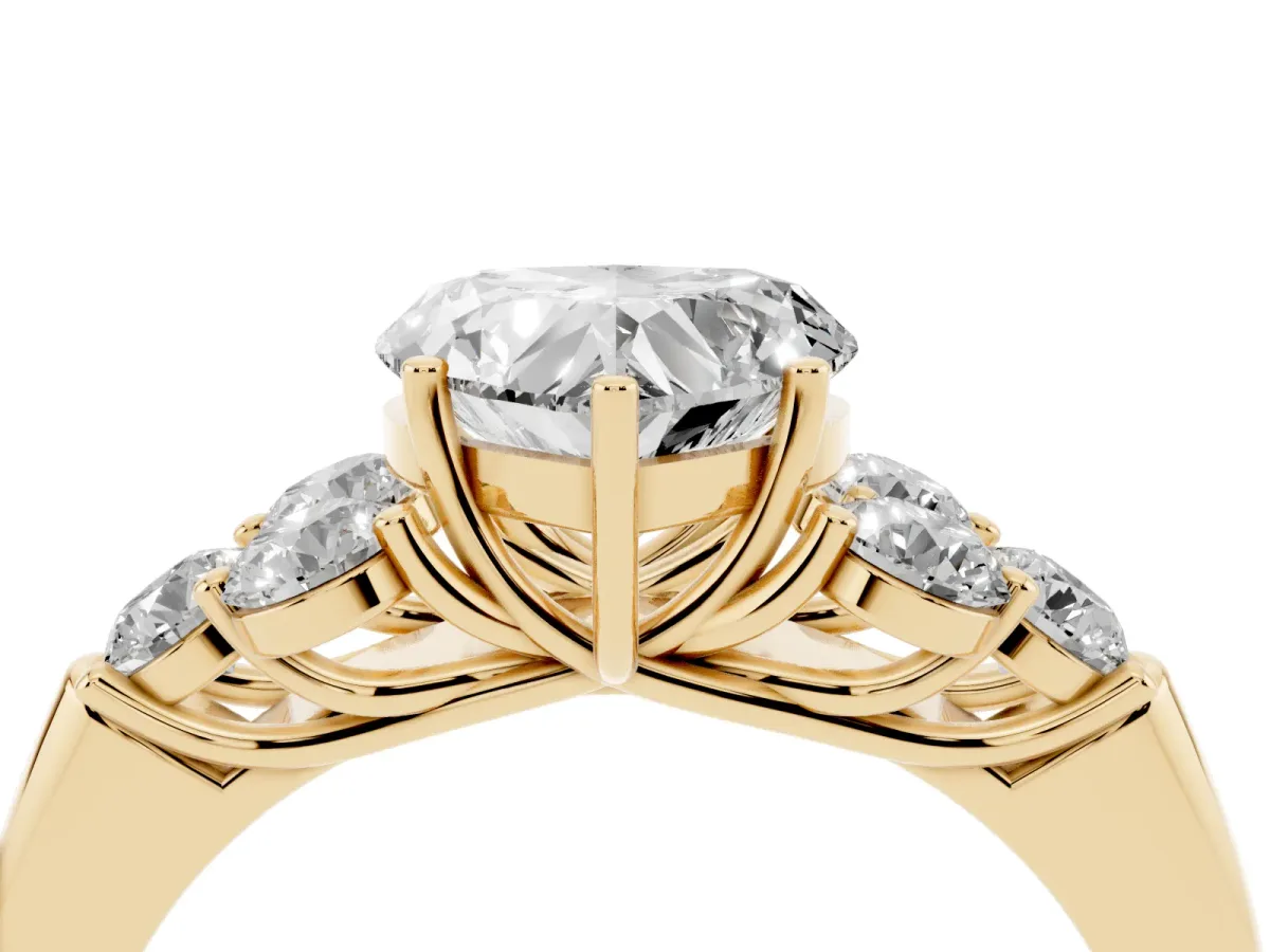 Heart Cut Cut Diamond Cluster Ring with Round Accent Stones and Prong Setting on a Classic Band Yellow gold