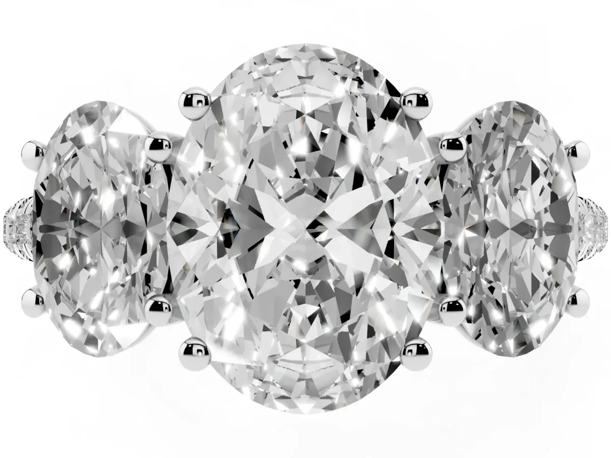 Three-Stone Oval Cut Diamond Ring with Round Pavé Band and Prong Setting Platinum