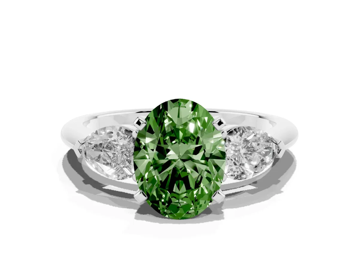 Fancy Green Three-Stone Oval Cut Diamond Ring with Pear Side Stones and Four-Prong Setting Silver