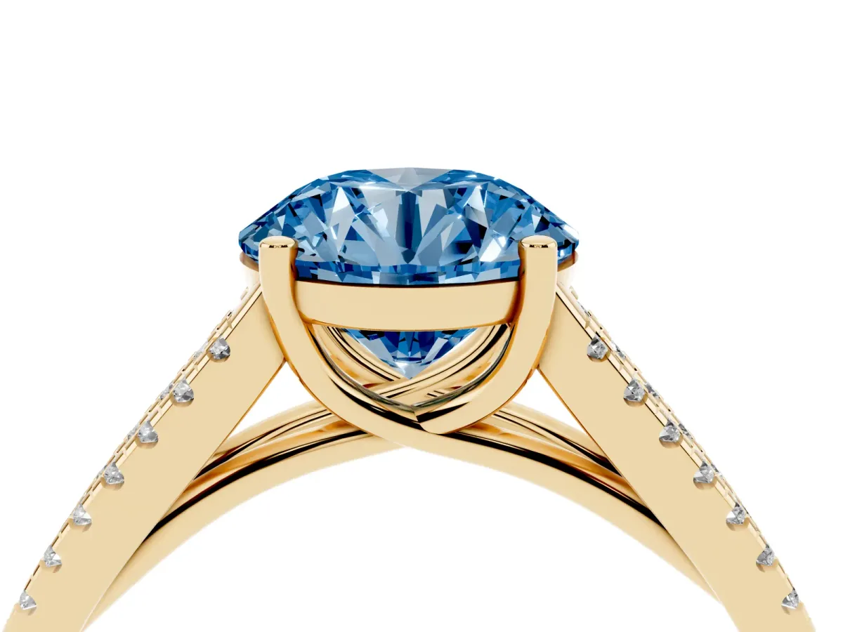 Fancy Blue Round Cut Diamond Solitaire Engagement Ring with Split Shank Pavé Band Yellow gold