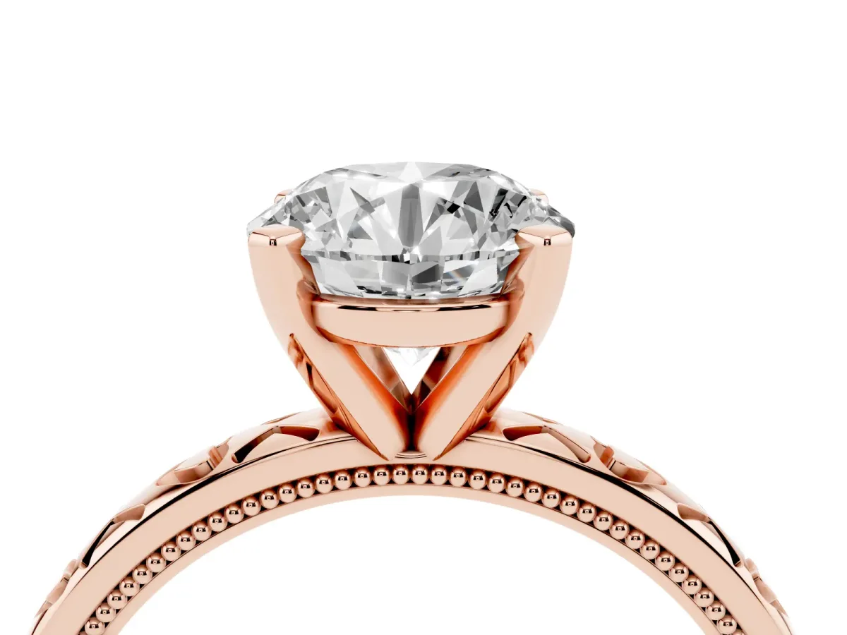 Round Cut Solitaire Diamond Engagement Ring with XO Engraved Band and Four-Prong Setting Rose gold
