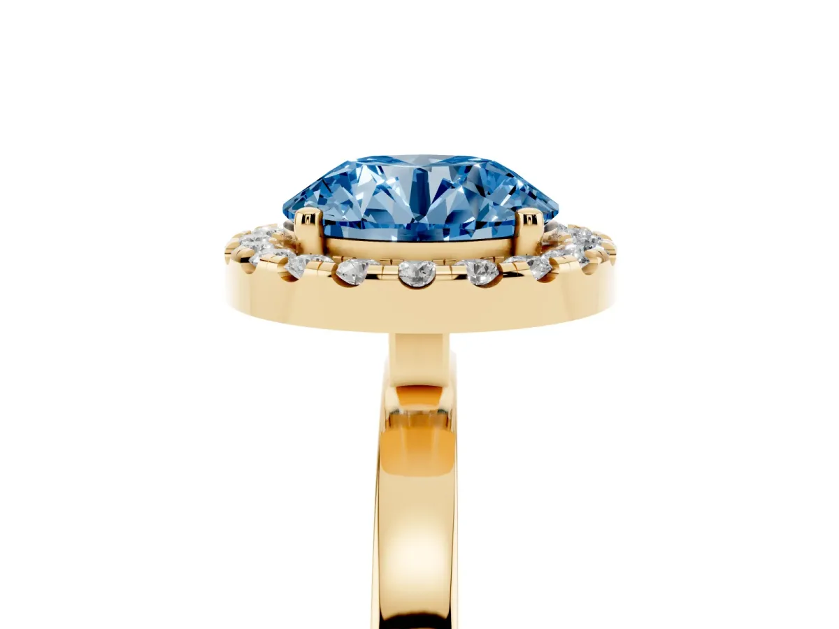 Fancy Blue Round Cut Halo Diamond Solitaire with Pavé Band and Four-Prong Setting Yellow gold