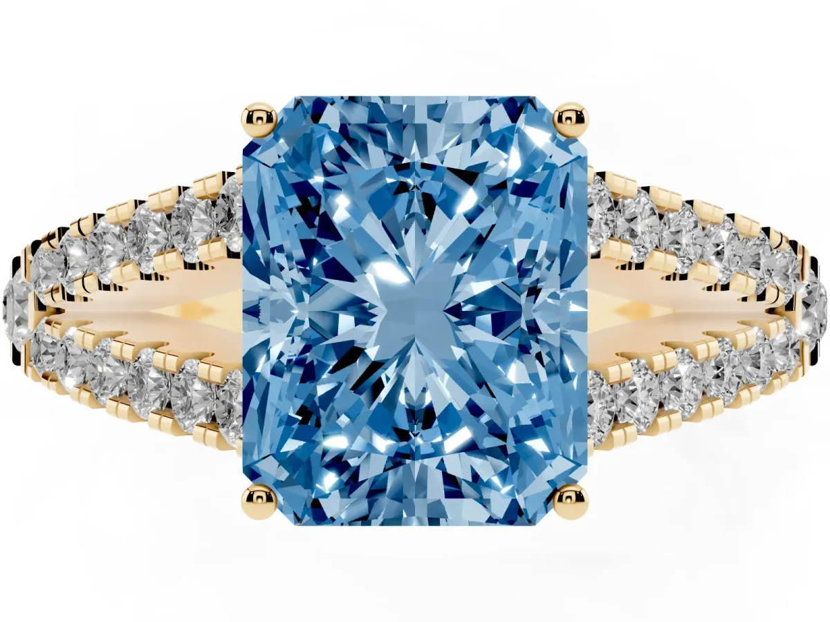 Fancy Blue Radiant Cut Diamond Split Shank Pavé Engagement Ring with Four-Prong Setting Yellow gold