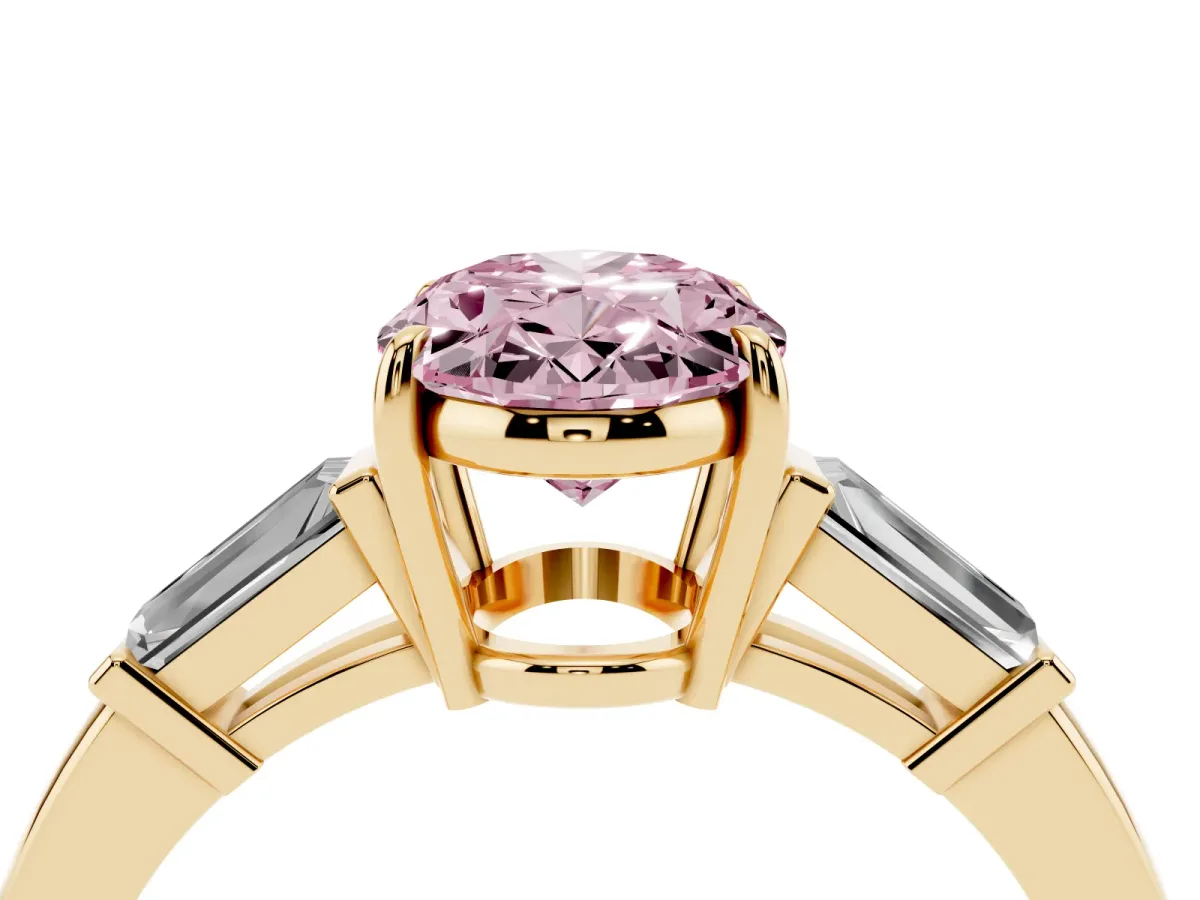 Fancy Pink Oval Cut Diamond Three-Stone Ring with Tapered Baguette Side Stones and Prong Setting Yellow gold