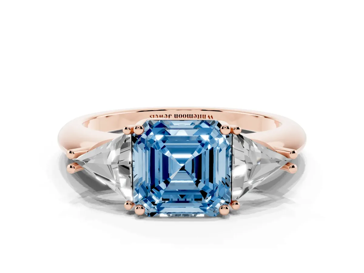 Fancy Blue Three-Stone Asscher Cut Diamond Engagement Ring with Trillion Side Stones and Prong Setting Rose gold