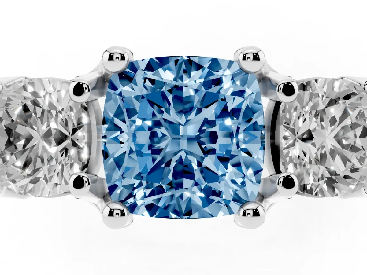 Fancy Blue Cushion Cut Diamond Three-Stone Ring with Channel Set Band and Four-Prong Setting White gold
