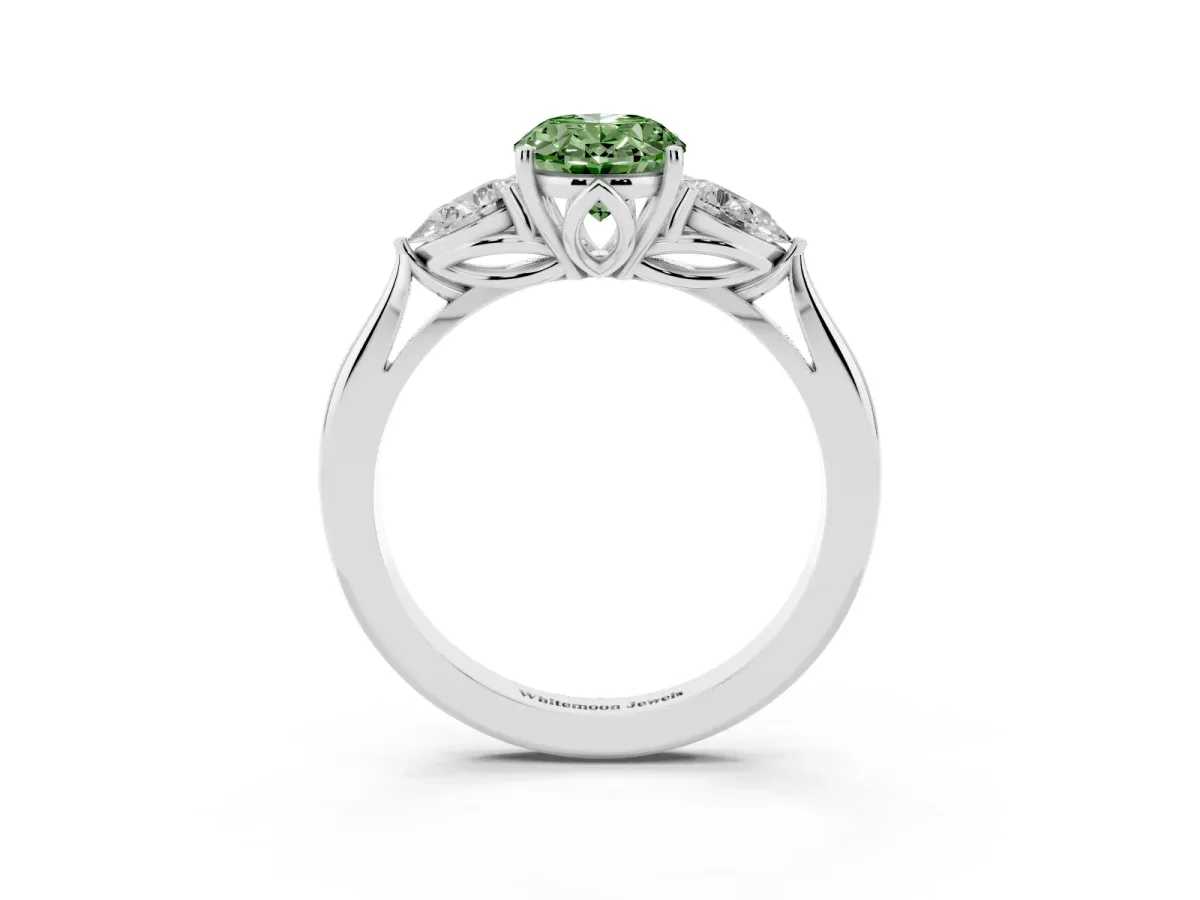 Fancy Green Three-Stone Oval Cut Diamond Ring with Pear Side Stones in Four-Prong Setting Platinum