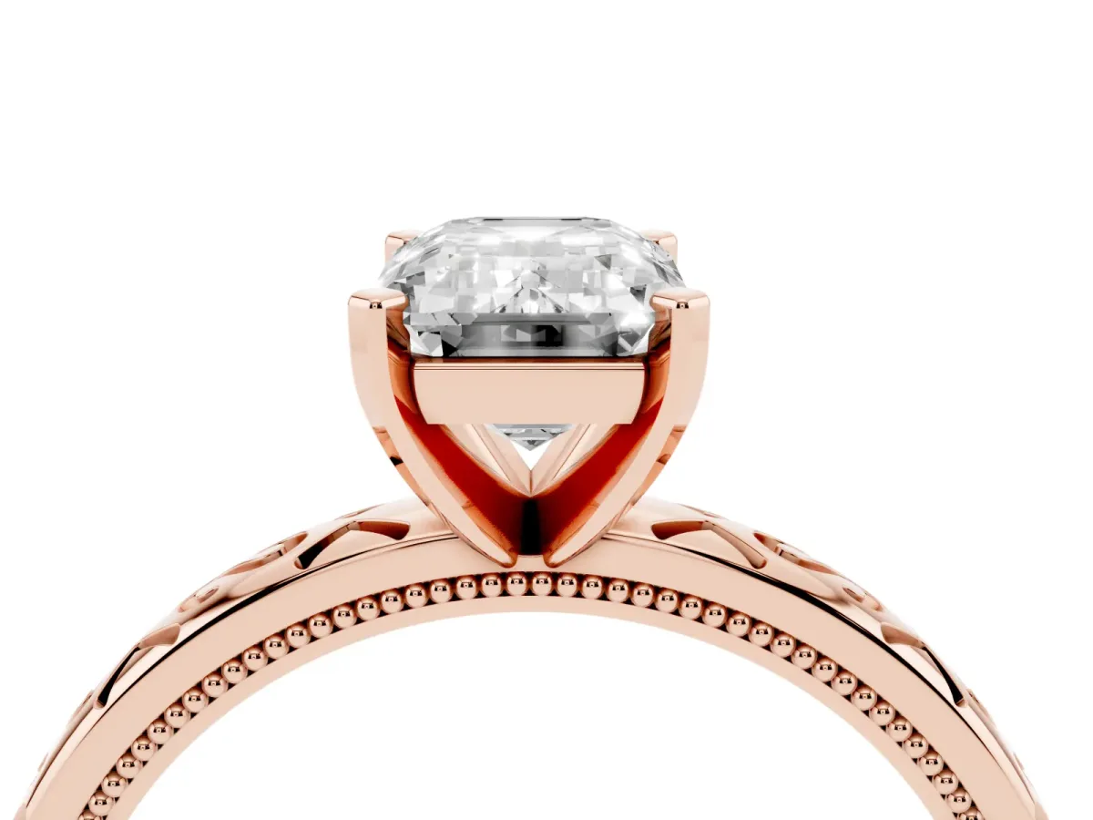 Emerald Cut Solitaire Engagement Ring with Scrollwork Band and Four-Prong Setting Rose gold