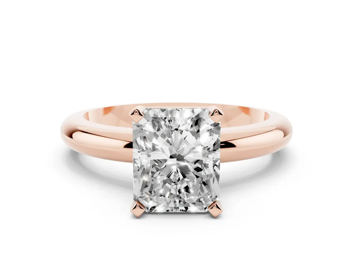 Radiant Cut Diamond Solitaire Engagement Ring with Round Band and Four-Prong Setting Rose gold