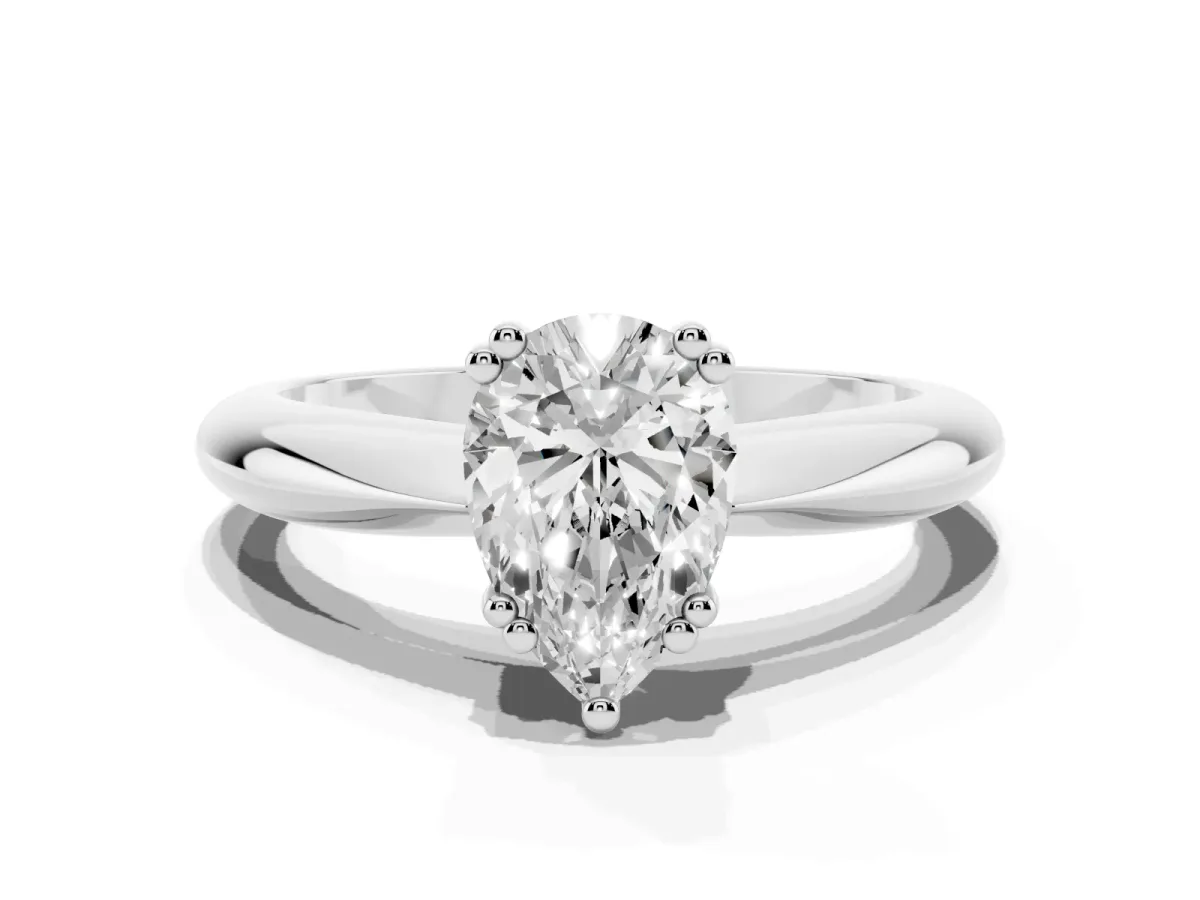 Pear Cut Cut Solitaire Engagement Ring with Tapered Band and Four-Prong Setting Platinum