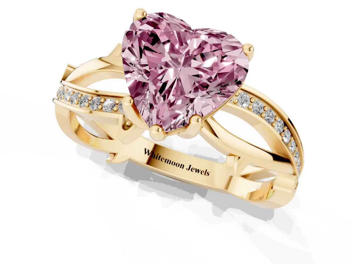 Fancy Pink Heart Cut Solitaire Twist Band with Pavé Accents and Four-Prong Setting Yellow gold