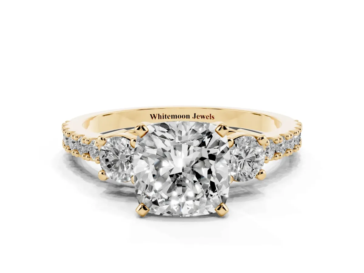 Cushion Cut Three-Stone Diamond Pavé Band with Prong Setting Yellow gold
