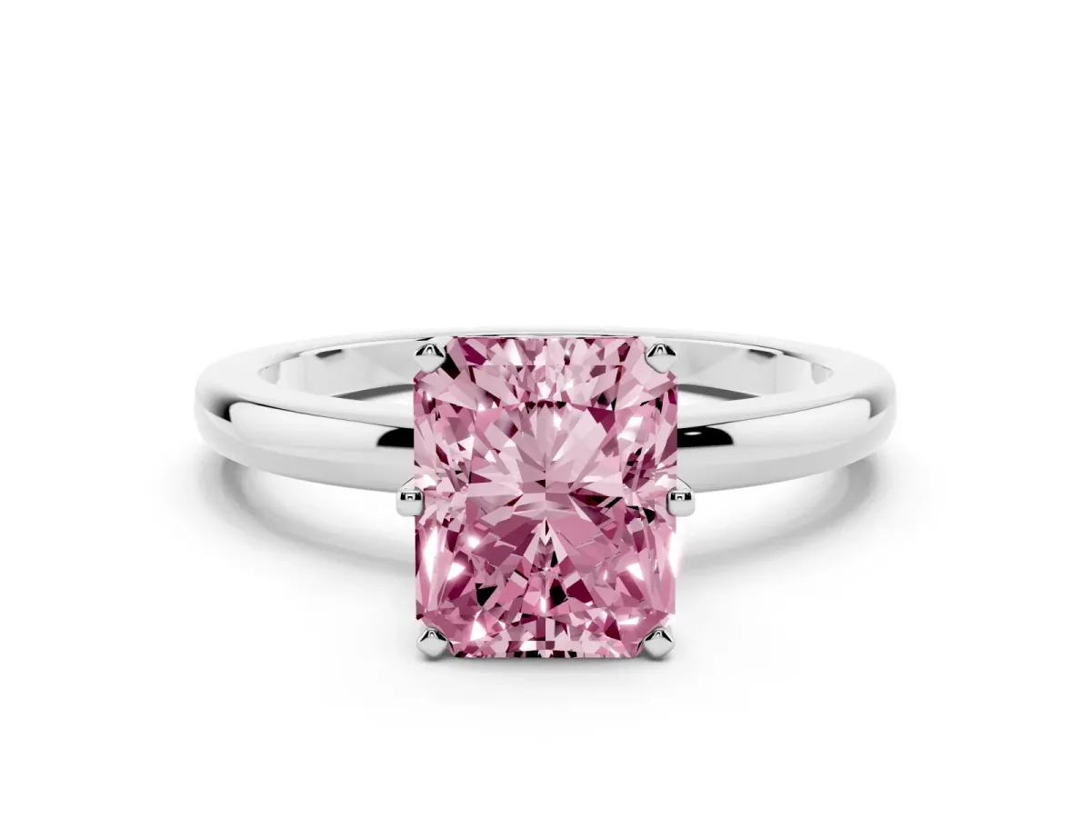 Fancy Pink Radiant Cut Solitaire Diamond Ring with Six-Prong Setting on a Classic Band Silver
