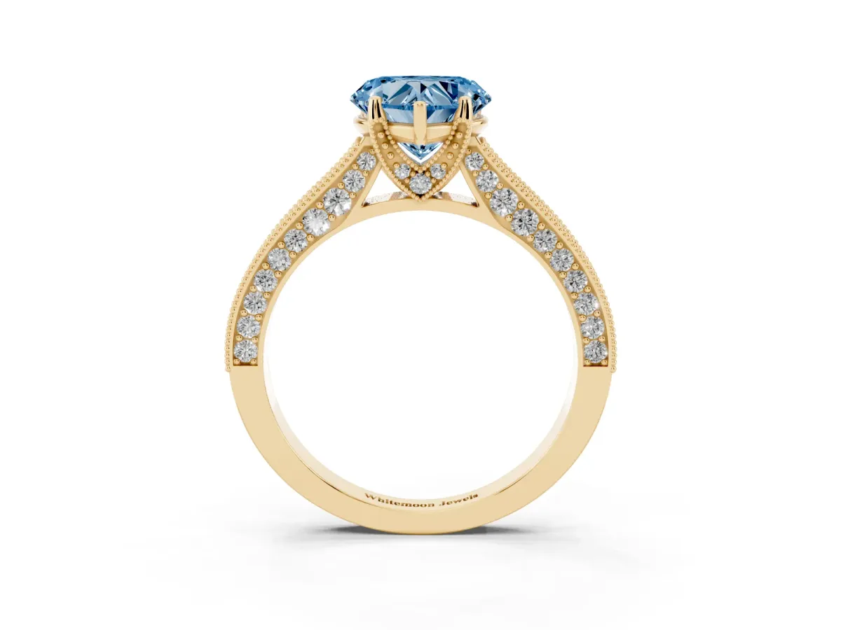 Fancy Blue Heart Cut Cut Diamond Solitaire Ring with Milgrain Pave Band and Four Prong Setting Yellow gold