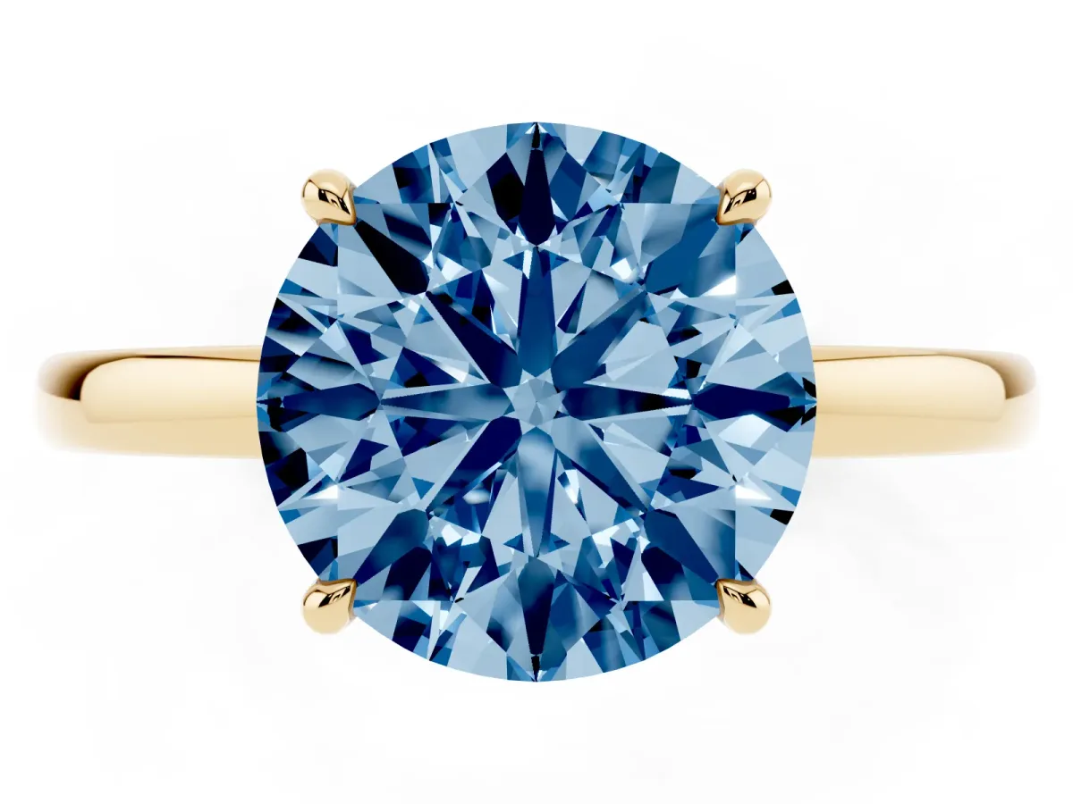 Fancy Blue Round Cut Solitaire Engagement Ring with Cathedral Band and Four-Prong Setting Yellow gold