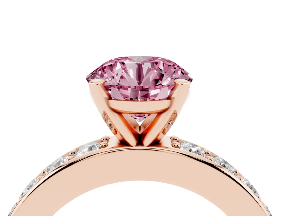 Fancy Pink Round Cut Diamond Engagement Ring with Channel Set Round Band and Prong Setting Rose gold