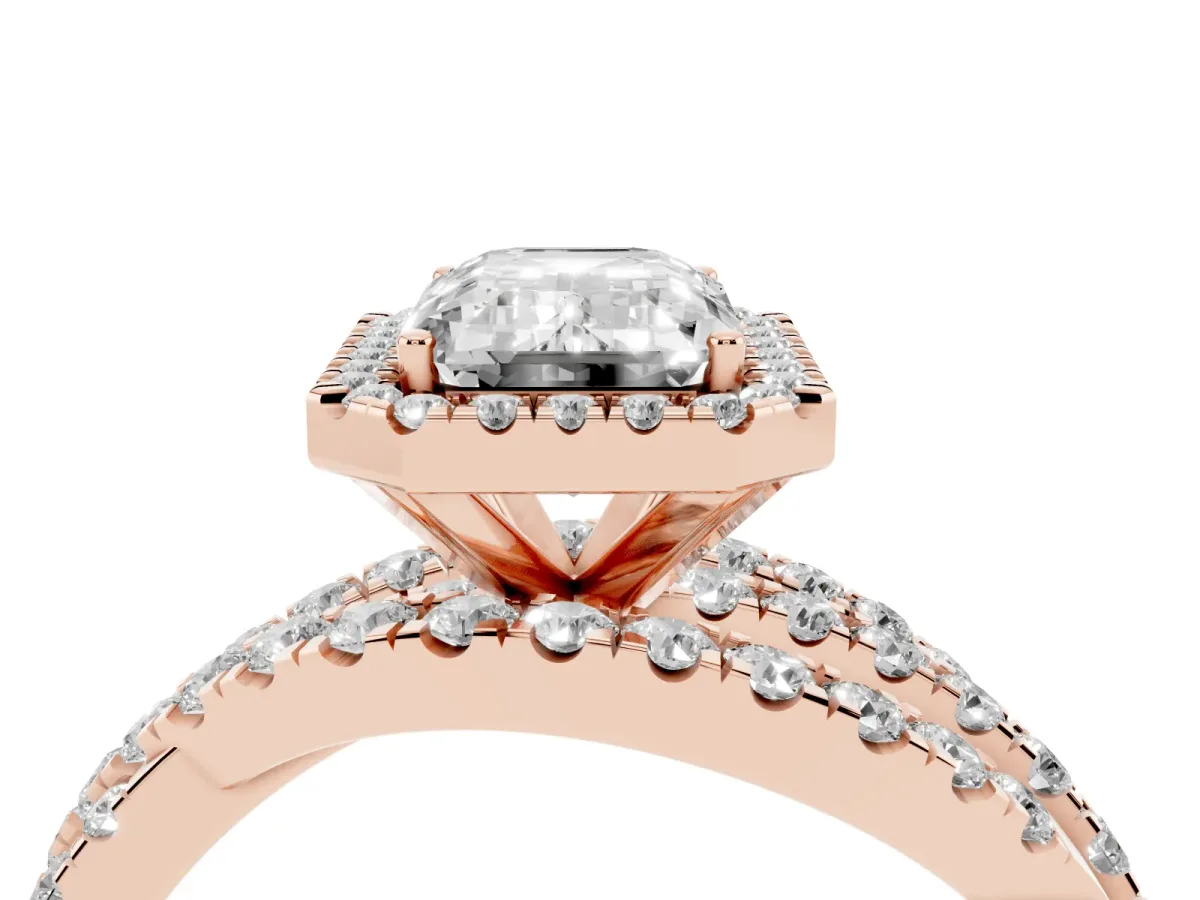 Emerald Cut Diamond Halo Ring with Round Split Shank and Prong Setting Rose gold