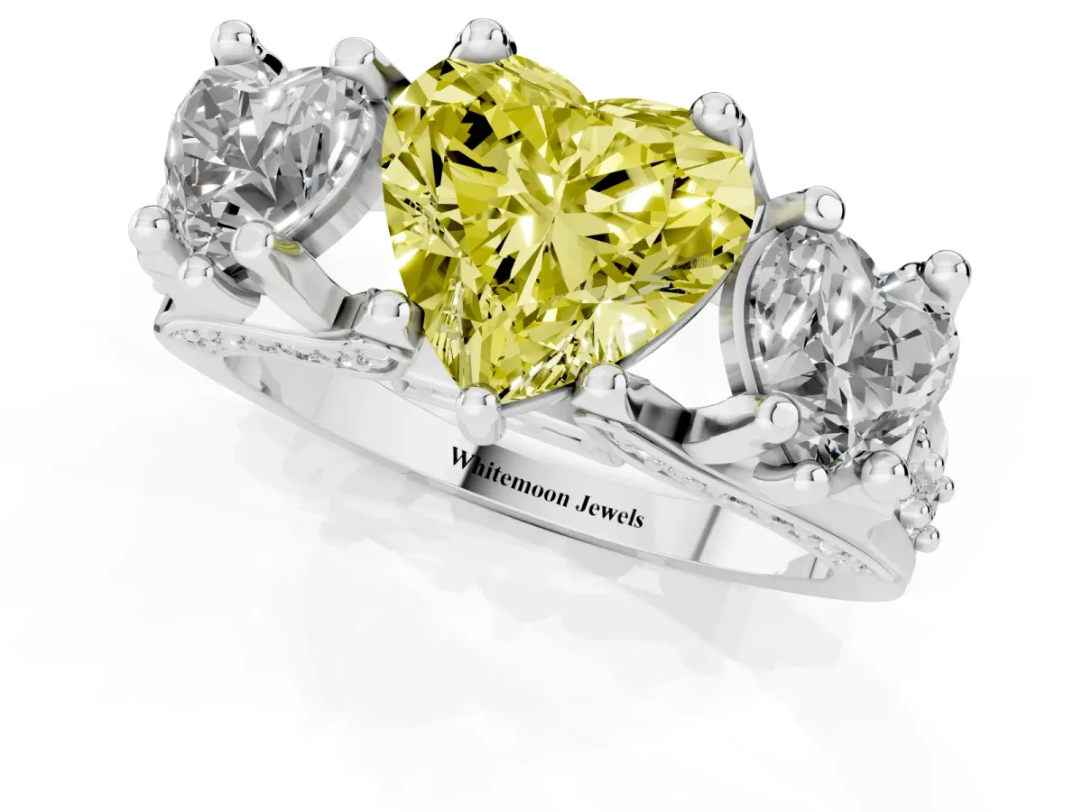 Fancy Yellow Heart Cut Diamond Three-Stone Ring with Channel Set Band and Four-Prong Setting White gold