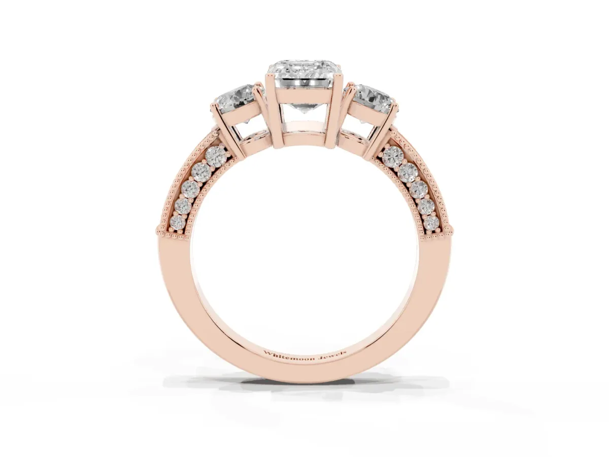 Emerald Cut Three-Stone Diamond Ring with Pavé Band and Four-Prong Setting Rose gold