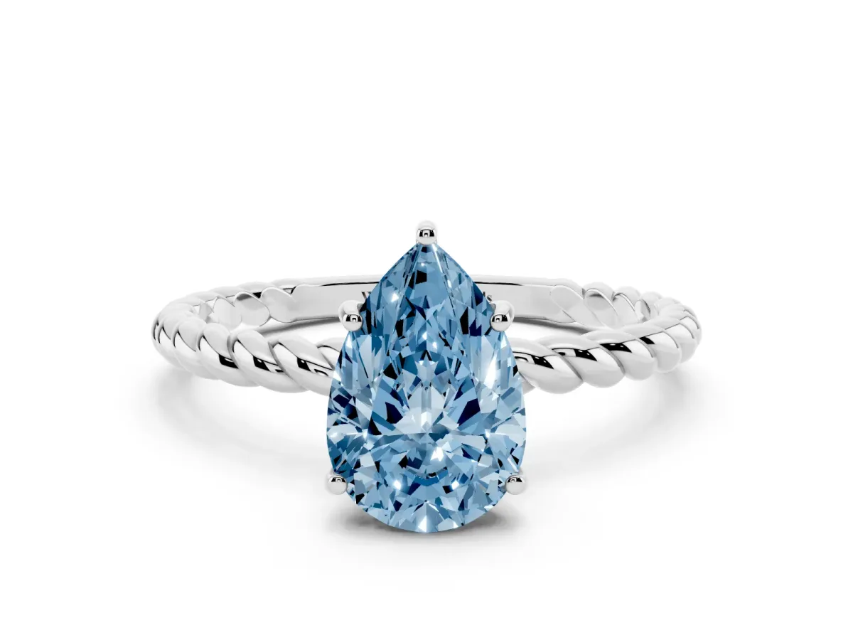 Fancy Blue Pear Cut Solitaire Twist Band Ring with Four-Prong Setting Silver