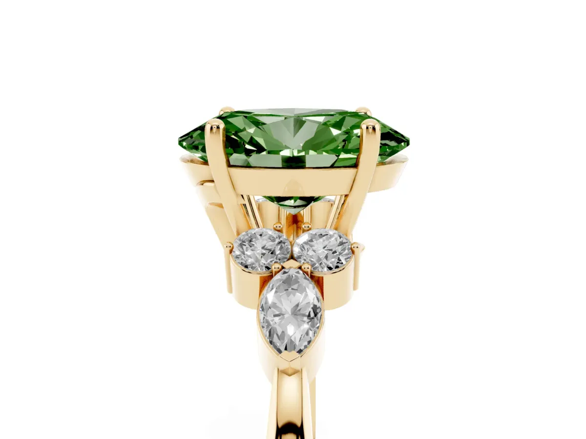 Fancy Green Oval Cut Brilliant Diamond Solitaire Ring with Pear Side Stones and Four-Prong Setting Yellow gold