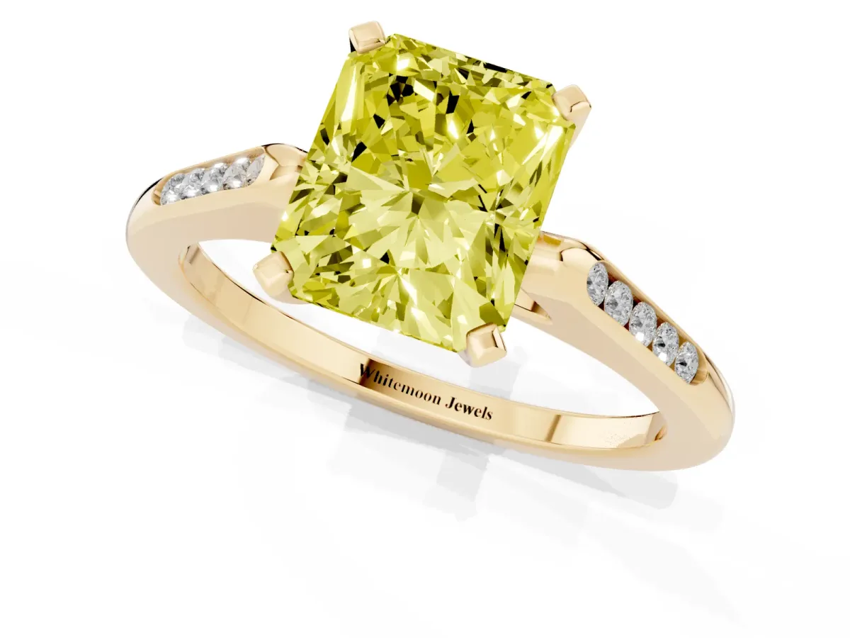 Fancy Yellow Radiant Cut Diamond Solitaire Ring with Channel Set Round Band and Prong Setting Yellow gold