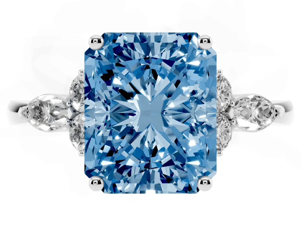 Fancy Blue Radiant Cut Brilliant Diamond Solitaire Ring with Pear Side Stones and Four-Prong Setting Silver