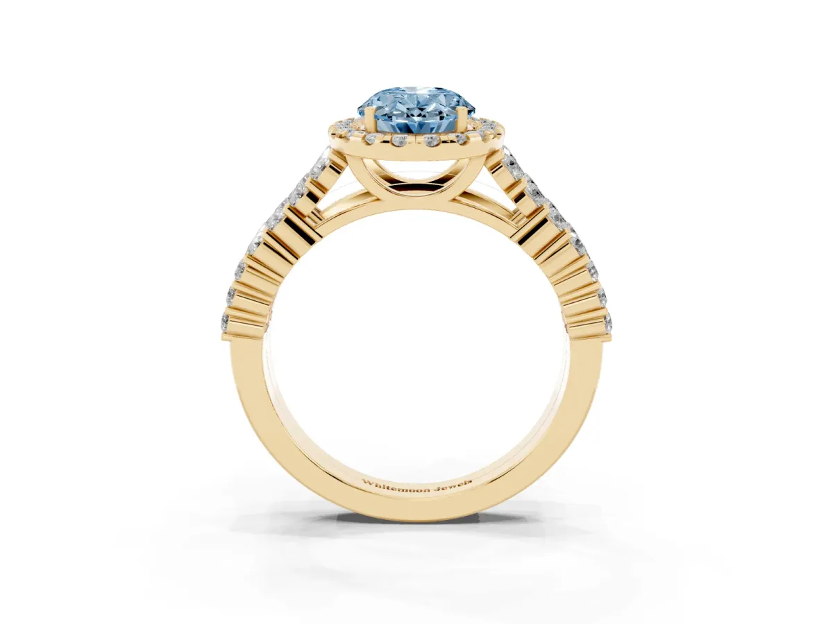 Fancy Blue Oval Cut Diamond Halo Engagement Ring with Triple Row Round Pavé Band and Prong Setting Yellow gold