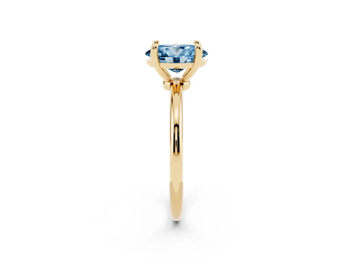 Fancy Blue Oval Cut Solitaire Diamond Ring with 4-Prong Setting on a Classic Band Yellow gold