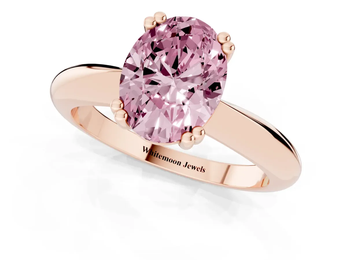 Fancy Pink Oval Cut Cut Solitaire Engagement Ring with Tapered Band and Four-Prong Setting Rose gold