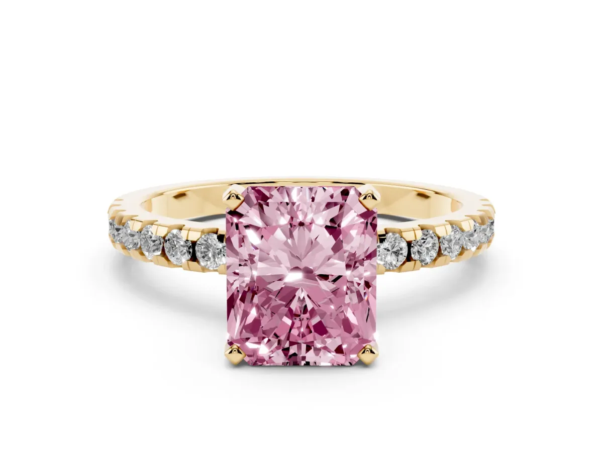Fancy Pink Radiant Cut Diamond Solitaire Ring with Round Pavé Band and Four-Prong Setting Yellow gold