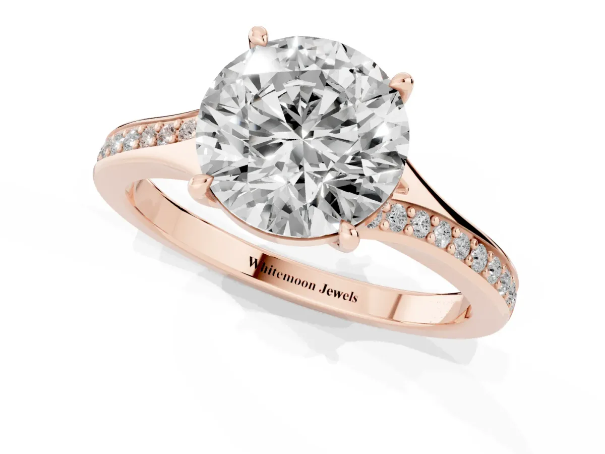 Round Cut Diamond Solitaire Ring with Pavé Band and Prong Setting Rose gold