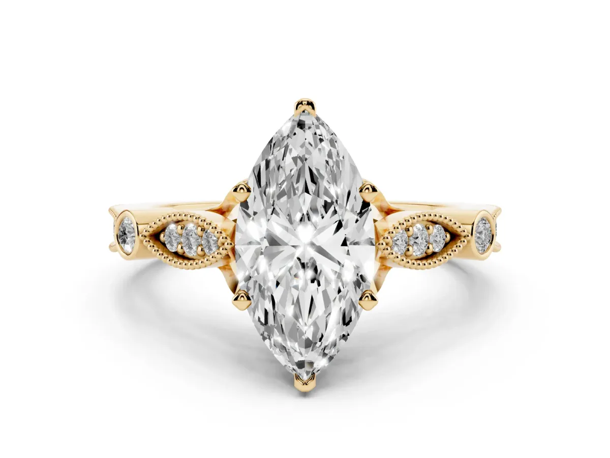 Marquise Cut Cut Diamond with Milgrain Marquise and Bezel Accents on a Solitaire Band with Prong Setting Yellow gold