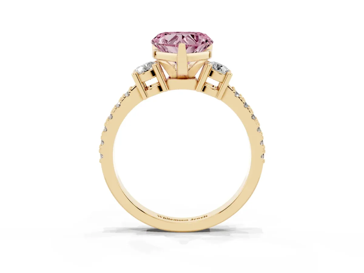 Fancy Pink Heart Cut Three-Stone Diamond Pavé Band with Prong Setting Yellow gold