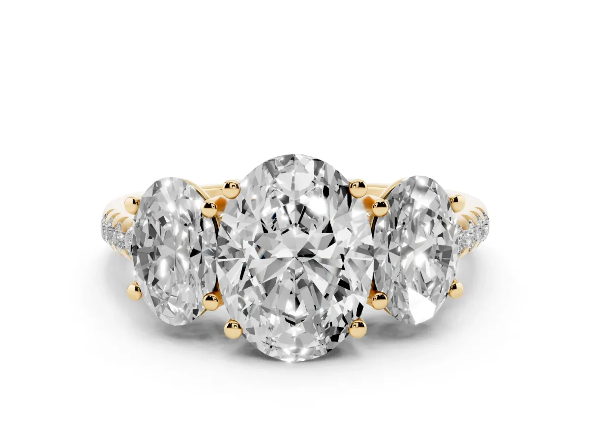Three-Stone Oval Cut Diamond Ring with Round Pavé Band and Prong Setting Yellow gold