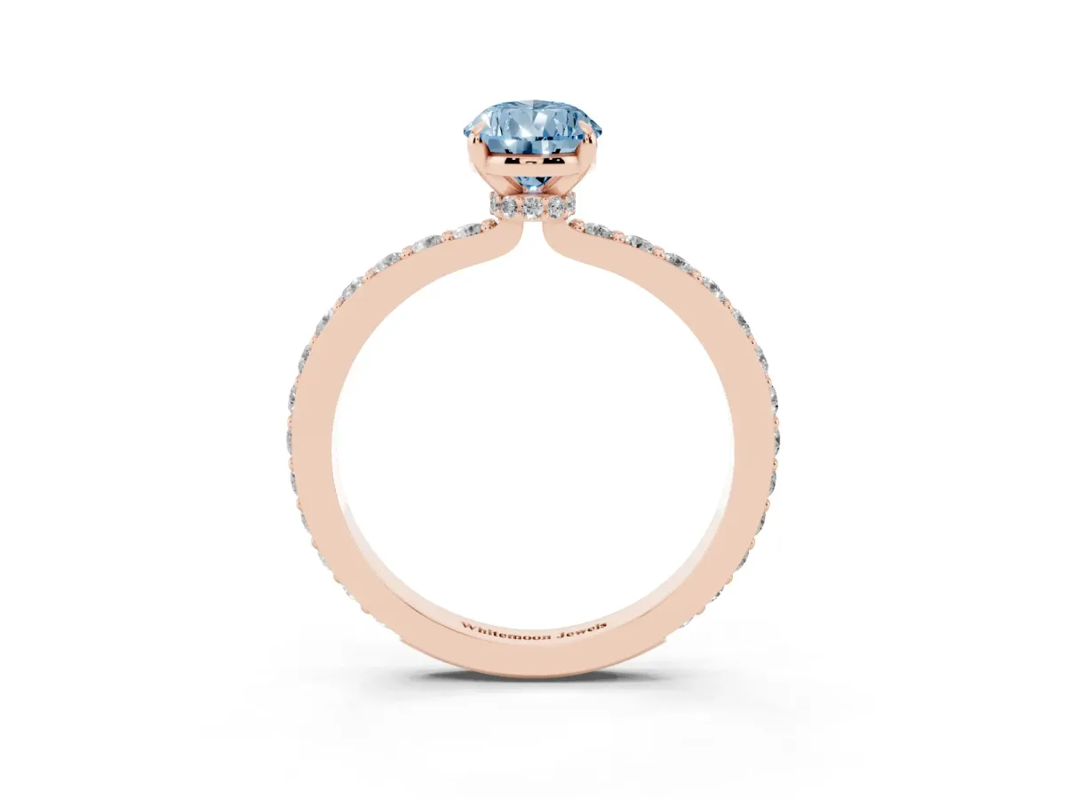 Fancy Blue Pear Cut Diamond Pavé Engagement Ring with Round Accents and Prong Setting Rose gold
