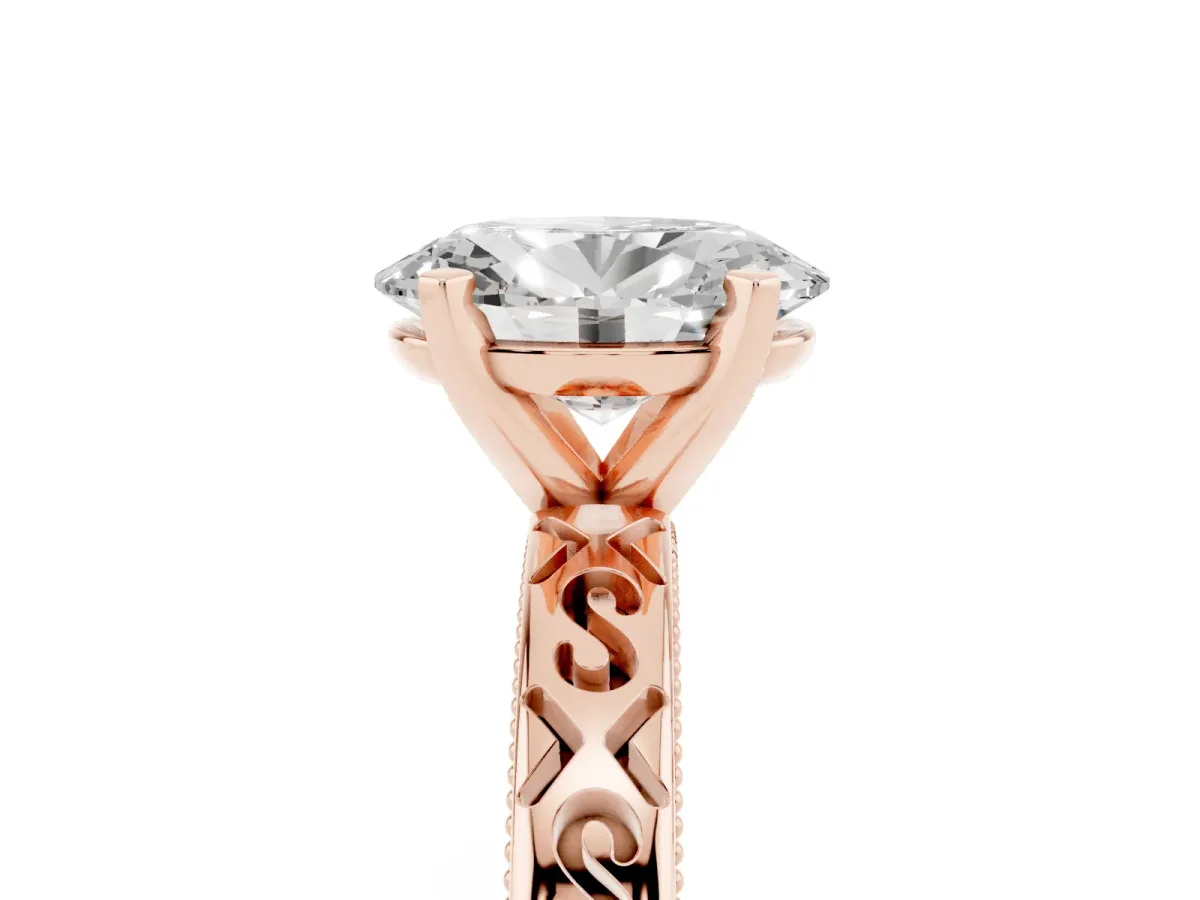Oval Cut Solitaire Engagement Ring with Scrollwork Band and Four-Prong Setting Rose gold