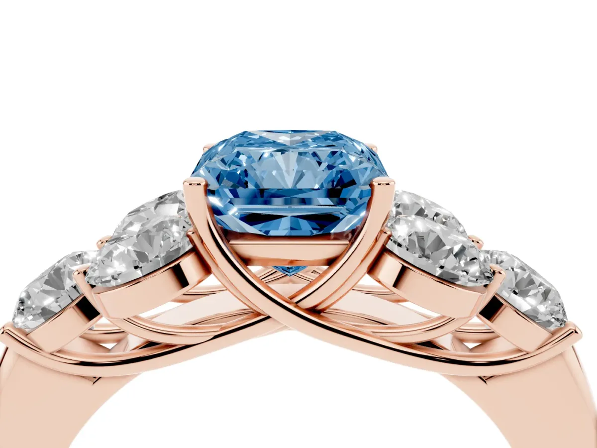 Fancy Blue Radiant Cut Cut Diamond Cluster Ring with Round Accent Stones and Prong Setting on a Classic Band Rose gold