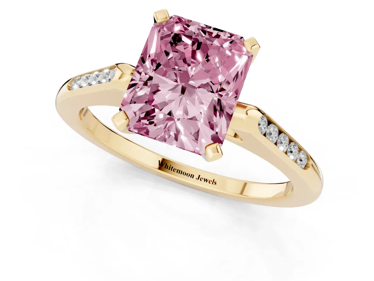 Fancy Pink Radiant Cut Diamond Solitaire Ring with Channel Set Round Band and Prong Setting Yellow gold
