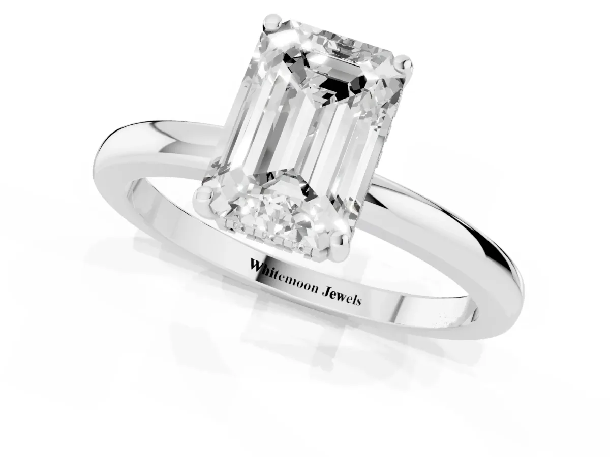 Emerald Cut Solitaire Diamond Ring with Prong Setting and Plain Band Silver