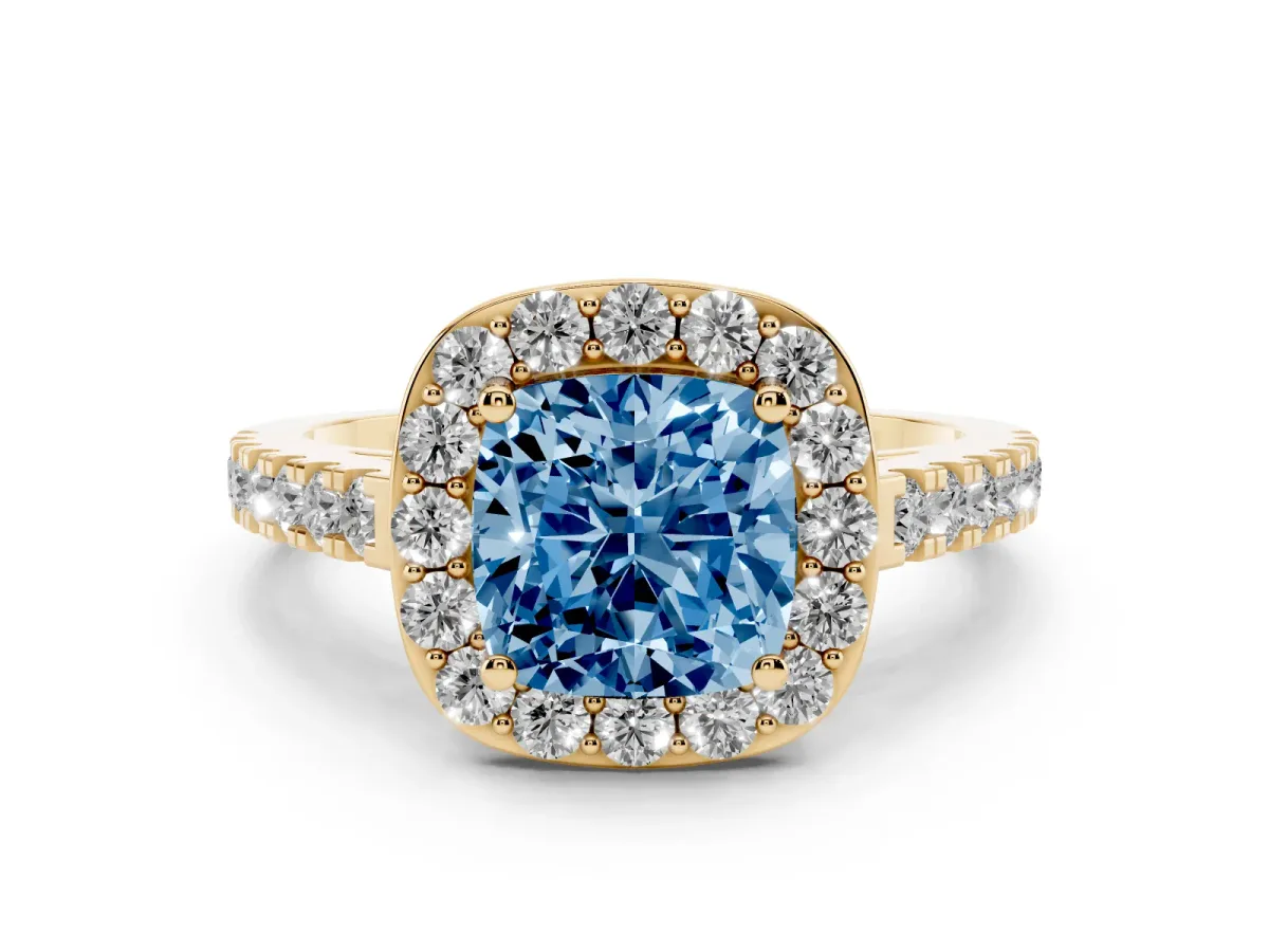 Fancy Blue Cushion Cut Diamond Halo Ring with Round Pavé Split Shank and Prong Setting Yellow gold