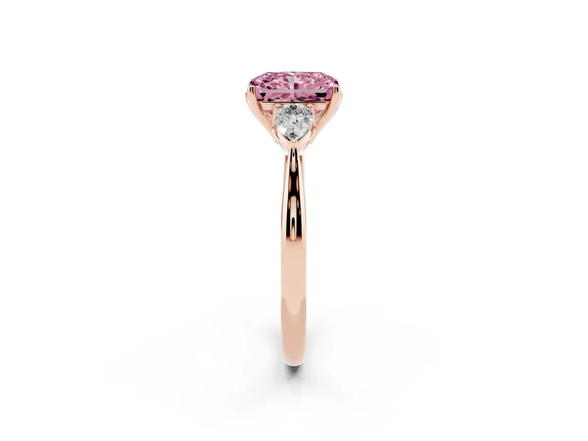 Fancy Pink Three-Stone Radiant Cut Diamond Ring with Pear Side Stones in Four-Prong Setting Rose gold